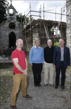  ??  ?? Huw O’Toole supervisin­g architect with Robert Byrne, Canon Sean Smith and Paul Kavanagh at Kilmurray Church.