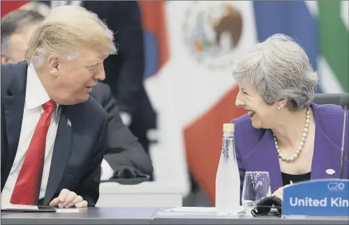  ?? PICTURE: AP PHOTO. ?? SUMMIT ENCOUNTER: Prime Minister Theresa May, speaks with US president Donald Trump during the G20 summit in Buenos Aires, Argentina.