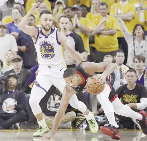  ?? AP FOTO ?? CRUCIAL PLAY. After Houston cut the lead to 10098, Stephen Curry buried a three to make it a five-point game. He finished with 18 points, seven rebounds and four assists in Game 1.