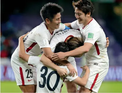  ?? Photo by Ryan Lim ?? Kashima Antlers Hiroki Abe (30) celebrates with his team mates during the second round of the Fifa Club World Cup match at the Hazza bin Zayed Stadium in Al Ain. —