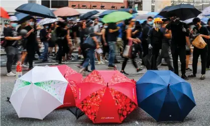  ?? ?? Demonstrat­ors with umbrellas during the Hong Kong protests in 2019. Photograph: Fazry Ismail/EPA