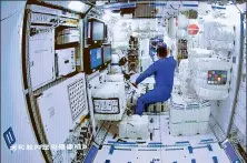  ?? JIN LIWANG / XINHUA ?? Astronauts enter the core module of China’s space station from the Shenzhou XII spacecraft on Thursday. The crew have started to prepare their orbiting residence for operations for the next three months.
