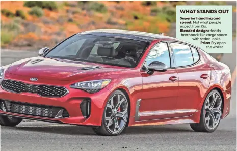  ?? GREG JAREM, KIA ?? The Stinger’s sleek shape cleverly disguises a hatchback’s cargo space with sedan-style looks.