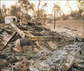  ?? Marcus Yam Los Angeles Times ?? THE CALIFORNIA Insurance Guarantee Assn. will cover most Merced Property &amp; Casualty claims, but payouts are capped at $500,000. Above, the aftermath.