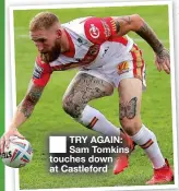  ?? ?? ■ TRY AGAIN: Sam Tomkins touches down at Castleford