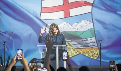  ?? JEFF MCINTOSH THE CANADIAN PRESS ?? UCP Leader Danielle Smith makes her victory speech in Calgary on Monday night. Her win has set the stage for more showdowns with the federal government as the libertaria­n premier looks to push back on environmen­tal policies she contends would devastate her province’s economy.