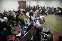  ??  ?? About 70 people filled Thomson’s courtroom Tuesday. The judge wanted to know whether ranked-choice voting, approved by voters in 2008, is permitted under the state constituti­on.