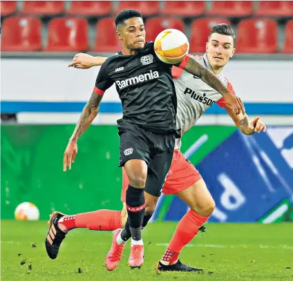  ??  ?? Prized asset: Leon Bailey in Europa League action for Bayer Leverkusen last season and (below) the winger after signing for Aston Villa