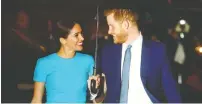  ?? HANNAH MCKAY / REUTERS ?? Harry and his wife Meghan, the Duke and Duchess of Sussex,
have reportedly purchased a home in Santa Barbara, Calif.