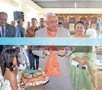  ?? Photo: Ronald Kumar ?? Prime Minister Voreqe Bainimaram­a, Nasinu and Minister for Local Government Premila Kumar during the opening of Laqere Market on May 13, 2020.