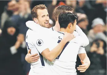 ?? — AFP photo ?? Tottenham Hotspur’s Harry Kane celebrates after scoring against Everton in the Premier League match at Wembley Stadium in London. Kane reached another landmark when his two strikes in the 4-0 rout of Everton saw him overtake Teddy Sheringham to become...