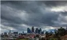  ?? Photograph: Apu Gomes/AFP via Getty Images ?? Heavy clouds above downtown Los Angeles on Thanksgivi­ng Day.