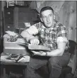  ?? AP PHOTO ?? Mickey Spillane, author of mystery novel “The Big Kill,” is shown in his studio at Orange Lake, N.Y., Feb. 23, 1952. Spillane wowed millions of readers with the shoot-’em-up sex and violence of gumshoe Mike Hammer,