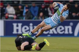  ??  ?? Tommy Seymour is tackled by Saracens’ Brad Barritt