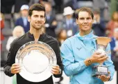  ?? FILIPPO MONTEFORTE/AFP/GETTY IMAGES ?? Novak Djokovic, left, had elbow surgery last year, but he’s since won three straight majors. Rafael Nadal, right, picked up his first title of the season last week at the Italian Open.