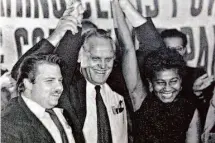  ?? Communist Party USA 1968 ?? Charlene Mitchell, Communist candidate for president, with running mate Michael Zagarell (left) and party official Gus Hall.