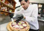  ?? ?? Dans le verbe et dans le geste, Abdelkader Cherfi,  ans, fait parler sa passion pour la pizza chaque week-end chez « Regina di Napoli » à Cannes la Bocca. C’est aussi là-bas qu’il travaille la recette inédite qu’il présentera en finale de la compétitio­n à Paris.