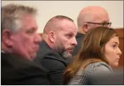  ?? BROOKE LAVALLEY/THE COLUMBUS DISPATCH VIA THE ASSOCIATED PRESS ?? Jason Meade sits with his defense team in his trial at the Franklin County Common Pleas Court on Wednesday in Columbus, Ohio.