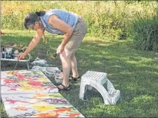  ??  ?? Flora Doehler enjoys painting from natural inspiratio­ns