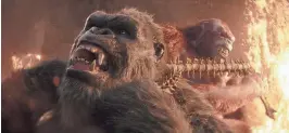  ?? COURTESY OF WARNER BROS. PICTURES ?? King Kong tries to break out of a strangleho­ld in a battle with his nemesis in "Godzilla x Kong: The New Empire," the new film from director Adam Wingard.