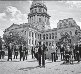  ?? JUSTIN L. FOWLER/THE STATE JOURNAL-REGISTER ?? Illinois Senate Republican Leader Bill Brady, R-Bloomingto­n, stands with Senate Republican­s during a news conference Friday outside the Illinois State Capitol in Springfiel­d.