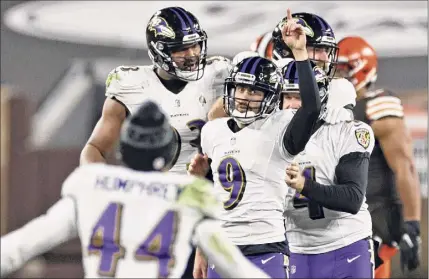  ?? Ron Schwane / Associated Press ?? Baltimore Ravens kicker Justin Tucker (9) celebrates after kicking a field goal during the second half of an NFL football game against the Cleveland Browns on Monday night in Cleveland. The Ravens won 47-42.