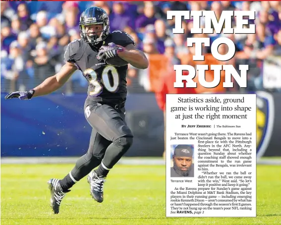  ?? KARL MERTON FERRON/BALTIMORE SUN ?? Terrance West Ravens rookie running back Kenneth Dixon, gaining a first down Sunday against the Bengals, has averaged more than 5 yards per carry over his past three games.