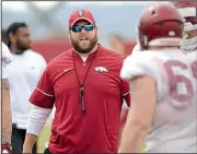 ?? NWA Democrat-Gazette/ANDY SHUPE ?? Arkansas offensive line coach Dustin Fry has been shuffling players to different positions while dealing with several injuries during the Razorbacks’ preseason camp.