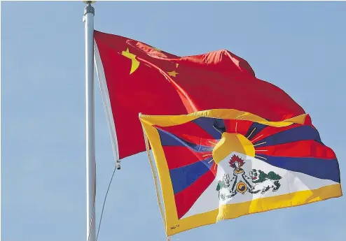  ?? DAVE ABEL / POSTMEDIA NEWS ?? A student in Canada who posted a picture of the Tibetan flag on Twitter found himself subject to the unwelcome attention of the Chinese government shortly afterward.