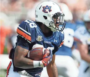 ?? JOHN REED/USA TODAY SPORTS ?? Auburn and running back JaTarvious Whitlow will face Oregon on Aug. 31 in Arlington, Texas.