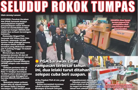  ??  ?? DIRAMPAS: Khaw (kanan) bersama pegawai PGA menunjukka­n rokok yang dirampas semasa operasi tersebut. KEJAYAAN BESAR: Khaw (dua kiri) bercakap pada sidang media semalam.