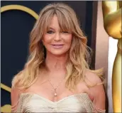  ?? JORDAN STRAUSS — INVISION/AP ?? Goldie Hawn arrives at the Oscars ceremony on March 2, 2014, in Los Angeles.