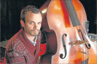  ?? Picture: TREVOR SAMSON ?? JAZZMAN: Shane Cooper’s plywood Czech double bass is about 40 years old and he says it is sounding better year by year.