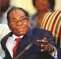  ?? AP ?? Zimbabe president Robert Mugabe has led his country for 37 years as either president or prime minister, and is accused of turning the nation’s health system into a ‘basket-case’.