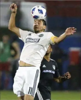  ?? STEWART F. HOUSE — THE ASSOCIATED PRESS ?? Union midfielder Alejandro Bedoya heads the ball during the second half against FC Dallas Saturday night in Frisco, Texas.