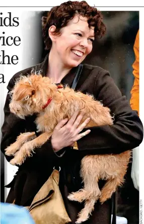  ?? ?? DOWN TO EARTH: Colman with her pet dog and, left, at this year’s Oscars