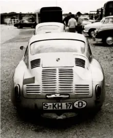  ??  ?? Left: Graham Hillʼs 356 Carrera Abarth in the paddock at the 1960 Tourist Trophy with the Jo Bonnier 356 Carrera GT behind (Porsche Archiv)