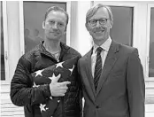  ?? U.S. STATE DEPARTMENT ?? Michael White, left, of California, stands with Brian Hook, the U.S. special envoy for Iran, on Thursday in Zurich.