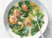  ?? JULIA GARTLAND/THE NEW YORK TIMES ?? A simmer in broth keeps the lean turkey meatballs moist and tender in this soup.