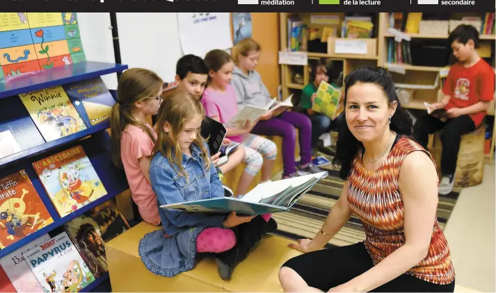  ?? PHOTO LE JOURNAL DE QUÉBEC, STEVENS LEBLANC ?? Dans la classe de Mélanie Giguère, on retrouve un coin lecture et une imposante bibliothèq­ue, dont le classement a été déterminé par les élèves.