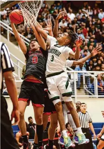  ?? Photos by Marvin Pfeiffer/Staff photograph­er ?? TreVaun Clark (0) was a force inside defensivel­y and offensivel­y with 13 points and 11 rebounds for the Thunderbir­ds.