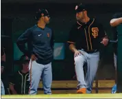  ?? RANDY VAZQUEZ — STAFF PHOTOGRAPH­ER ?? Bench coach Kai Correa, left, standing next to Gabe Kapler, is one of the mastermind­s behind the socially distant workouts.