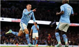  ?? ?? Phil Foden celebrates scoring against Bournemout­h in early November. His importance has come into focus since Kevin de Bruyne’s injury. Photograph: Catherine Ivill/Getty Images