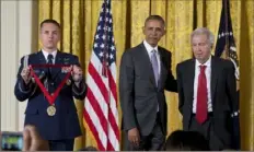  ?? Stephen Crowley/The New York Times ?? President Barack Obama, center, presents author Larry McMurtry, right, with the National Humanities Medal in 2015. Mr. McMurtry died Thursday. He was 84.