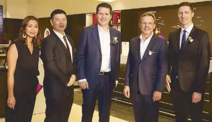  ??  ?? (From left) Power Plant Mall senior leasing manager Tin Coqueiro, Novateur Coffee Concepts Inc. managing director Patrick Pesengco, Nespresso head of Asia Renaud Tinel, Nestlé Philippine­s CEO Jacques Reber and Swiss Embassy Deputy Head of Mission...