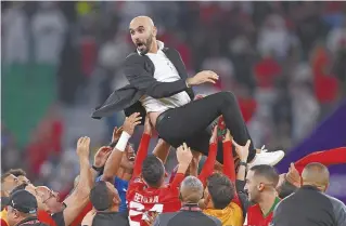  ?? ?? BELOW: Morocco made history at the 2022 FIFA World Cup in Qatar, becoming the first African nation to qualify for the semi-final stage of the prestigiou­s tournament.