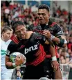  ?? PHOTOSPORT ?? Crusaders try scorers Whetu Douglas and Seta Tamanivalu.