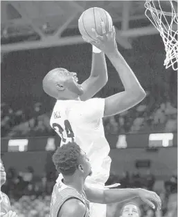  ?? STEPHEN M. DOWELL/ORLANDO SENTINEL ?? UCF center Tacko Fall scored a season-high 21 points Wednesday night against USF.