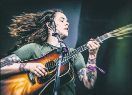  ?? EMILY BUTLER PHOTOGRAPH­Y ?? Billy Strings performs at the Sweetwater 420 Fest 2019 in Atlanta. The Michigan native is doing a virtual tour from Nashville as the coronaviru­s pandemic continues.