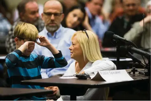  ?? Marie D. De Jesus / Houston Chronicle ?? Chris Crowley struggles to talk about his issues at school. His mother Camilyn Marceaux, right, also spoke to the representa­tives from the U.S. Department of Education’s Office of Special Education and Rehabilita­tive Services and the Texas Education...